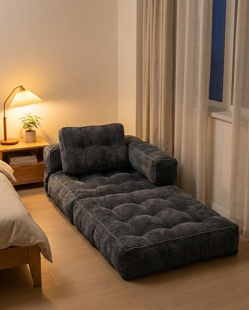 Le Nomi deplie en chaise longue dans chambre cosy